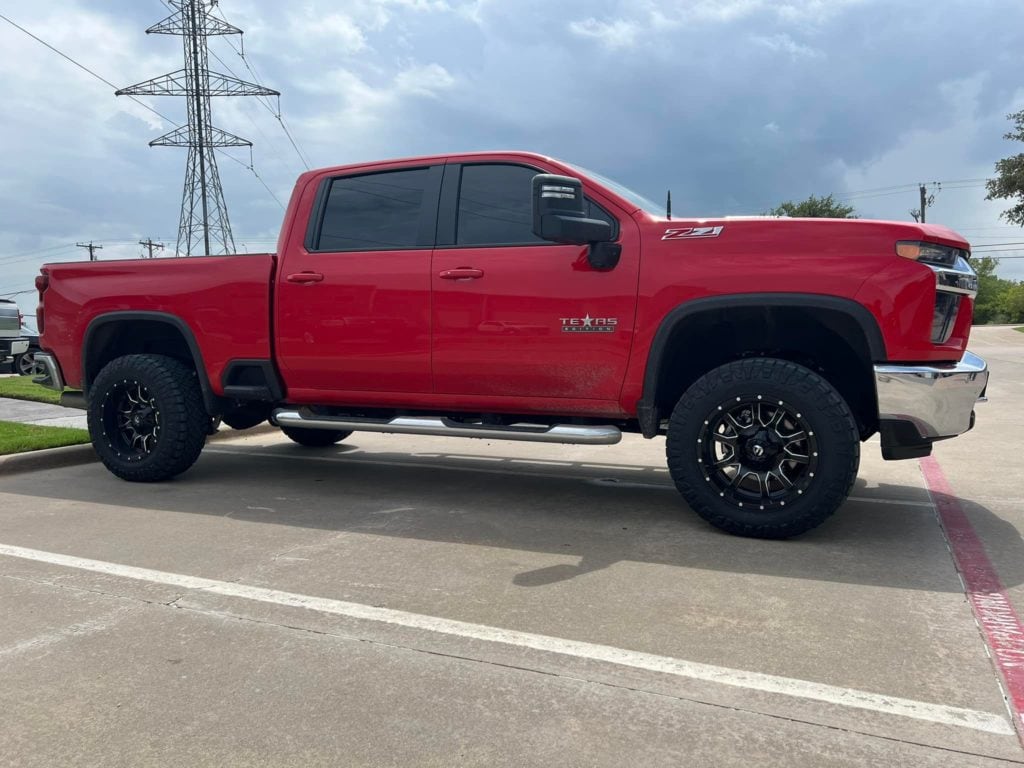 3in lift suspension on a red truck