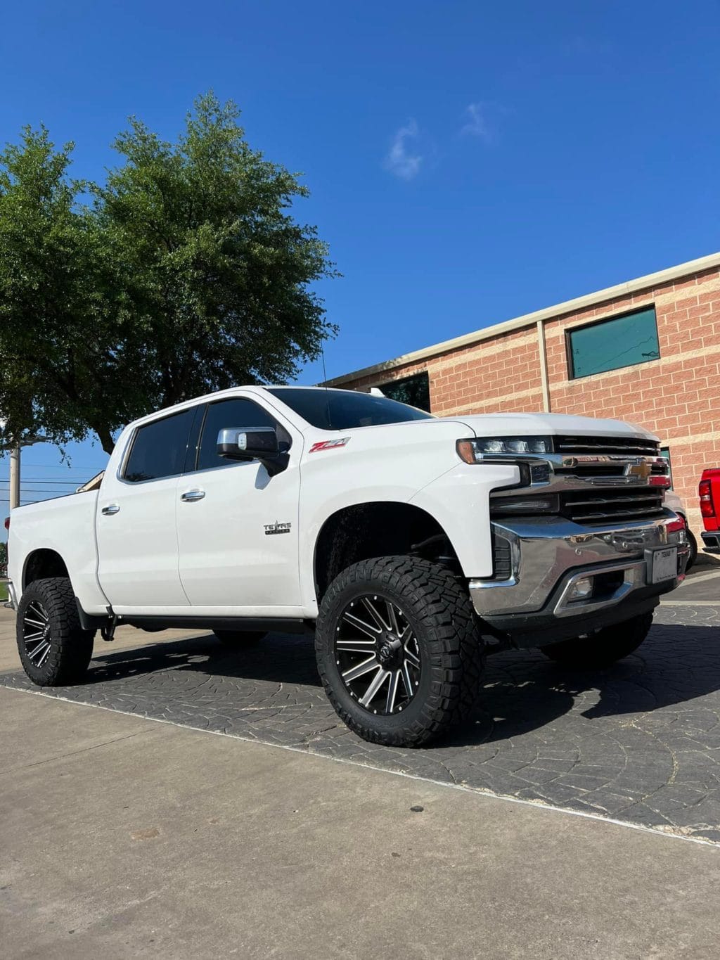 6in lift kit suspension on a white truck