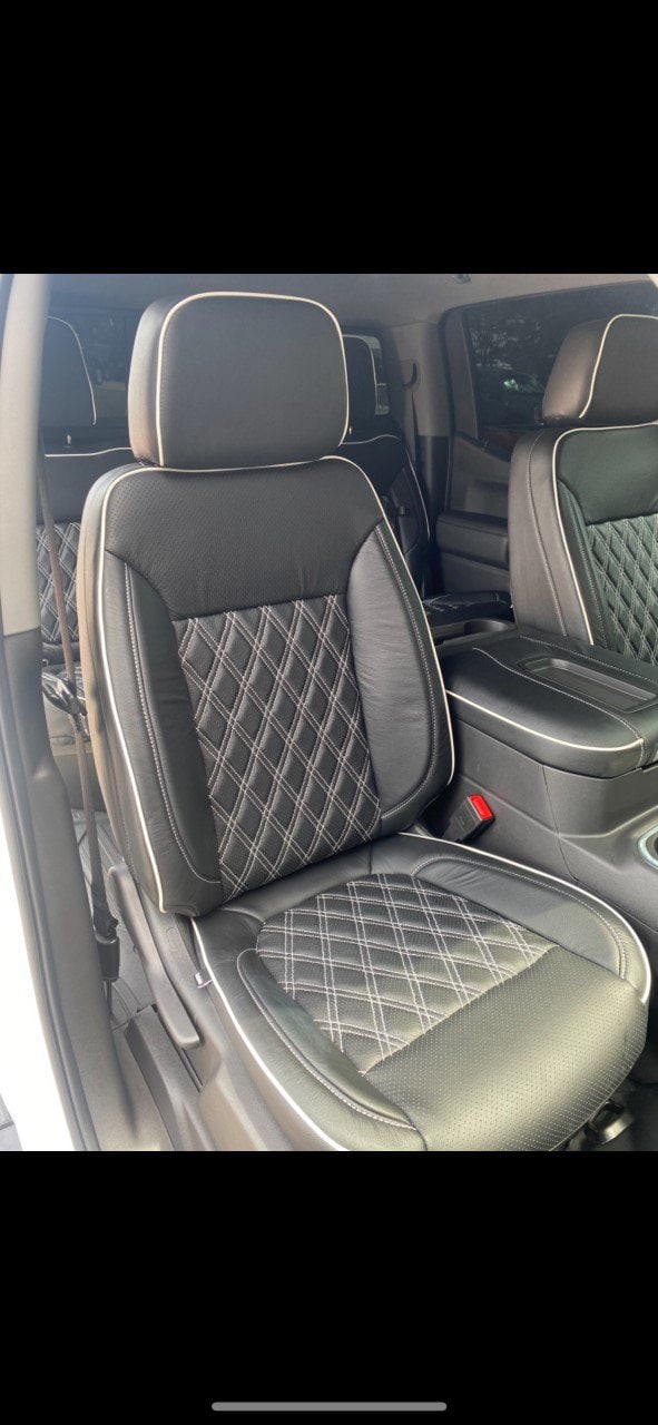 black leather seats with custom diamond pattern